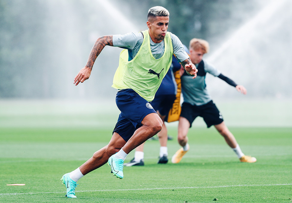 ON THE FRONT FOOT: Joao Cancelo, another of our returning players, goes through a sprinting drill
