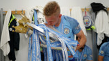 OURS: Oleks Zinchenko plants a kiss on the Premier League trophy.