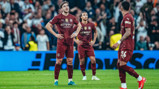 SETBACK: The players look dejected after Mbappe opens the scoring.