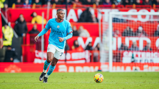 AKANJI: Plays the ball forward.