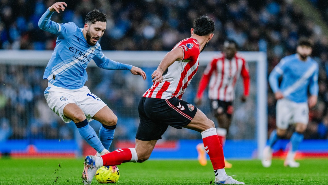 CHEEKY CHERKI: Shields the ball.