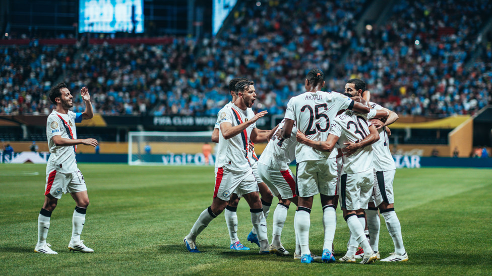 CELEBRATE  : And it's not long until his teammates join him!