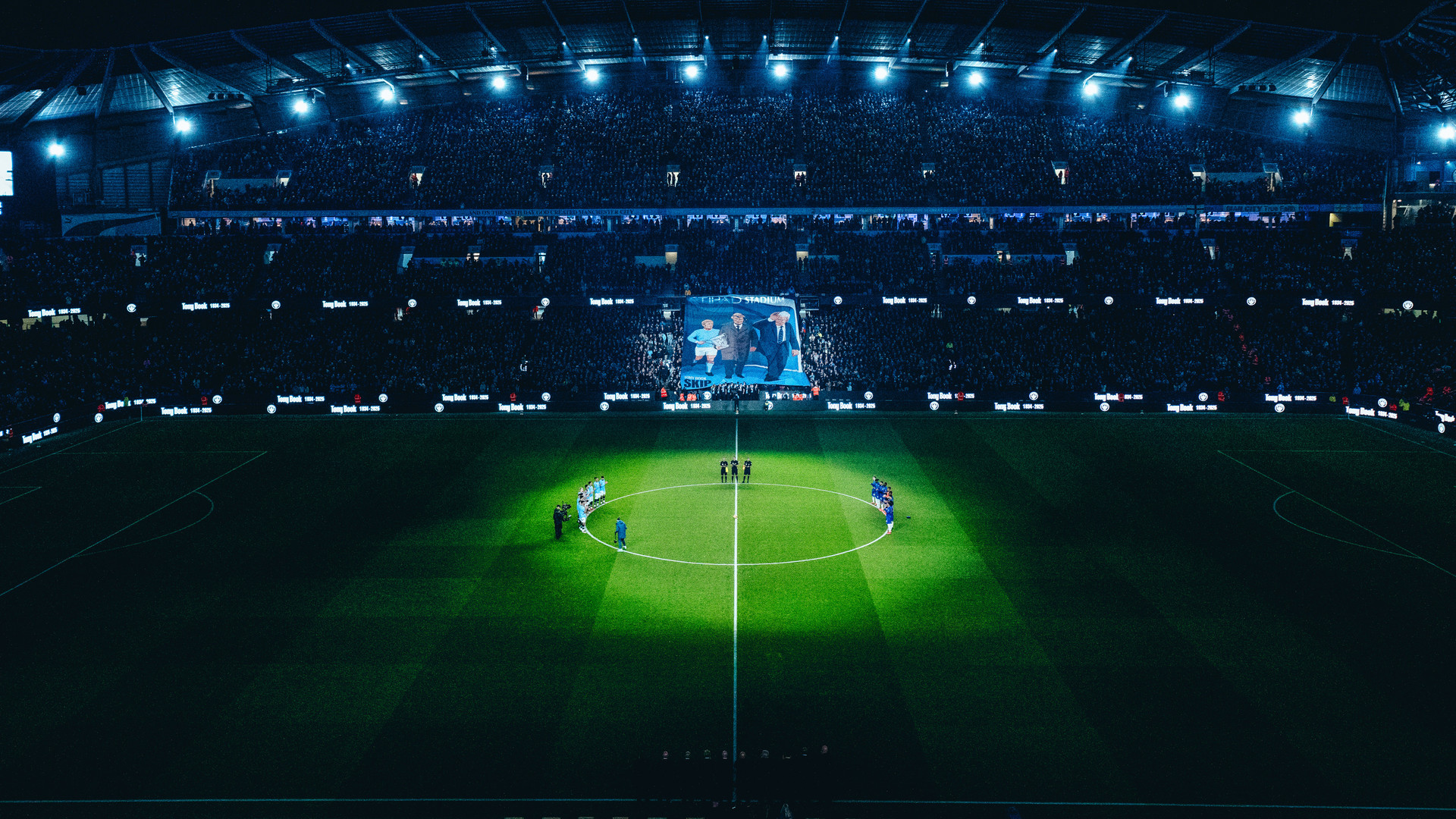 MOVING TRIBUTE: The Etihad pays pre-match homage to the late, great Tony Book, Denis Law and Bobby Kennedy