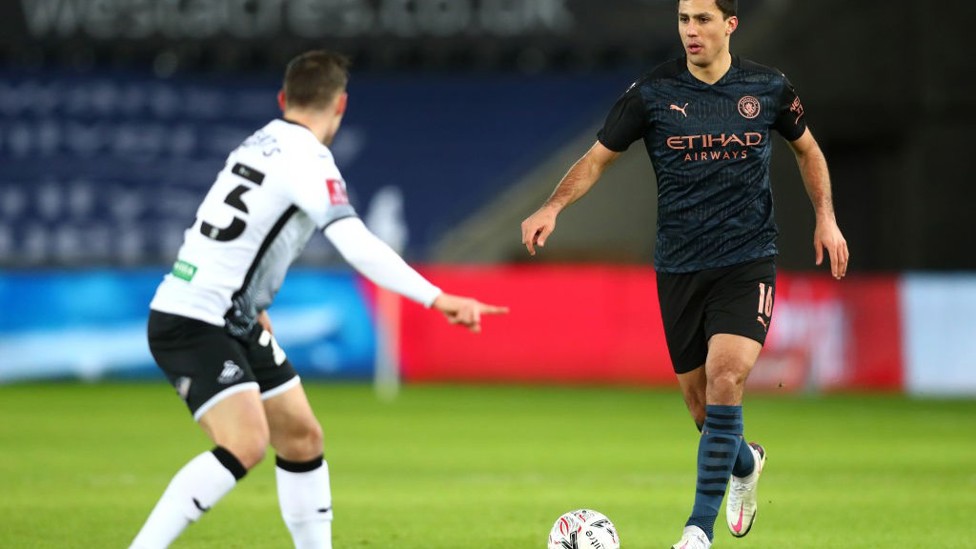 ANCHORMAN: Rodrigo brings the ball forward