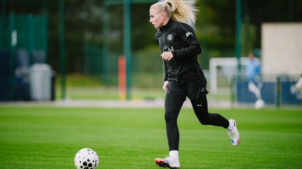 PUTTING THE YARDS IN: Alex Greenwood in possession