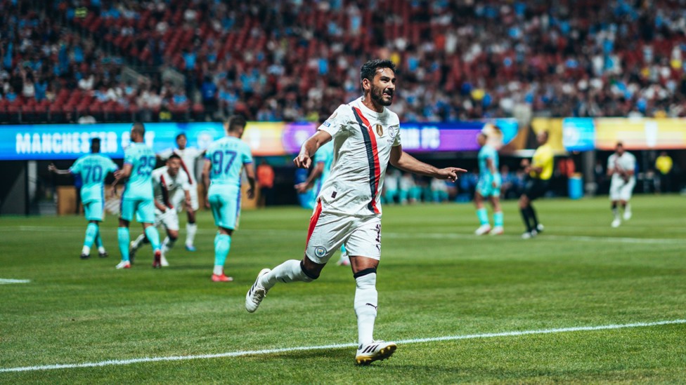 GOAL : Ilkay Gundogan celebrates his opener. 