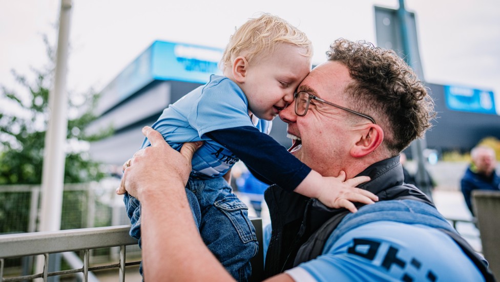 Generation game : A young fan enjoying a visit to the Etihad
