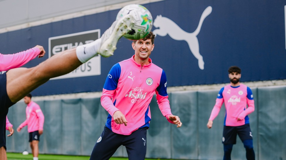 EYE ON THE BALL : John Stones watches the kicker