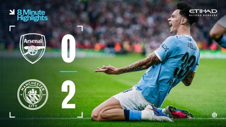 Football match result showing Arsenal 0-2 Manchester City with a player celebrating on the field.