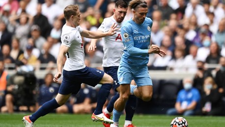 ON THE FRONT FOOT: Grealish carries City forward early on.