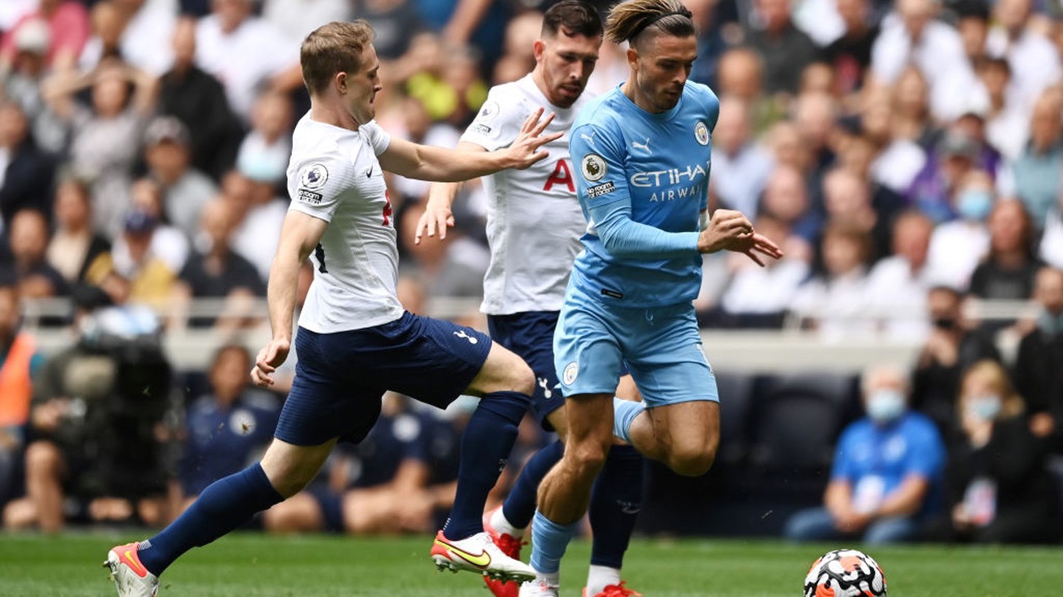 ON THE FRONT FOOT: Grealish carries City forward early on.