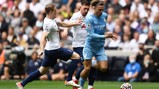 ON THE FRONT FOOT: Grealish carries City forward early on.