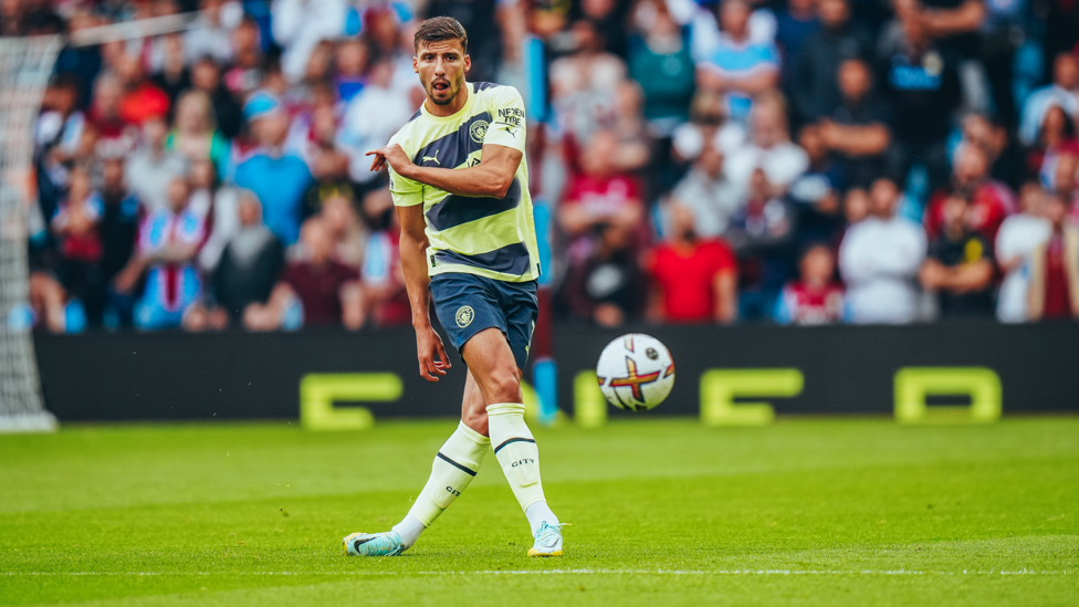 GAME TIME : Dias plays the ball forward.