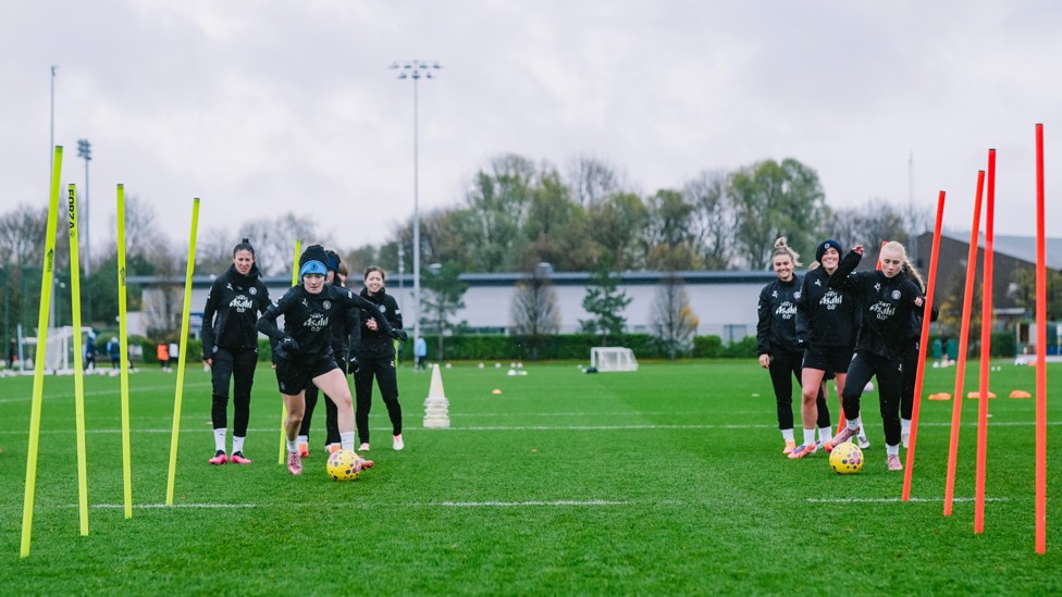 DOUBLE DRIBBLE : Lauren Hemp and Laura Blindkilde Brown lead the way