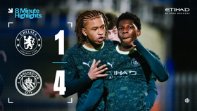 Chelsea vs Manchester City match highlights with score 1-4. Manchester City players celebrating a goal.