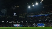 Two football teams lined up for a moment of silence in memoriam at Manchester City's stadium.
