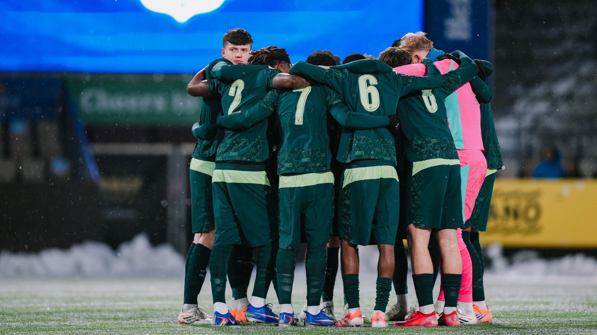 TOGETHER : City have one final team talk before kick-off.