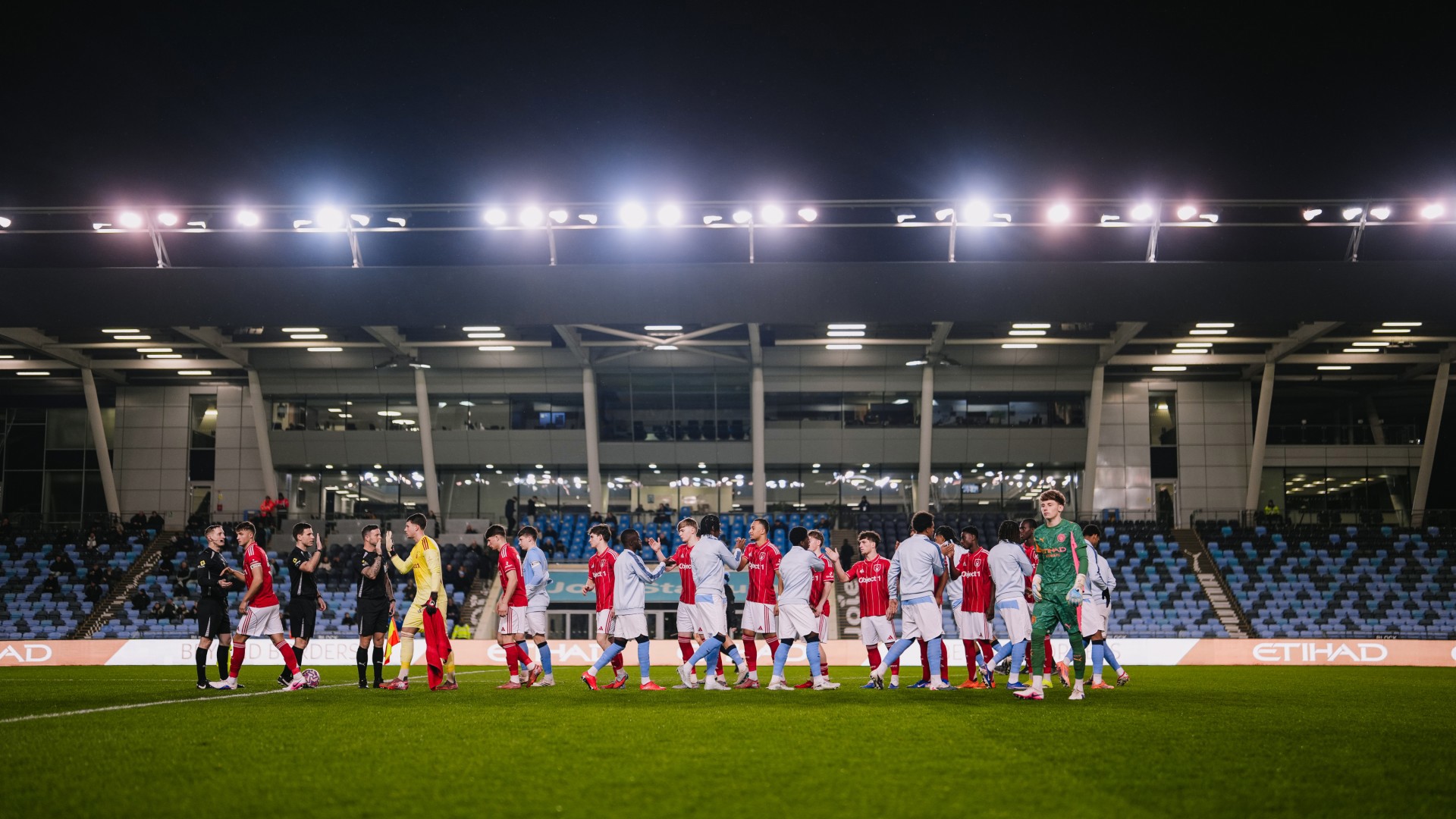 LINE-UPS : City and Forest shake hands ahead of kick-off.