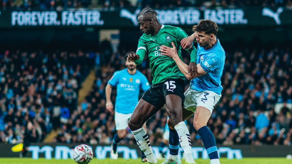 BATTLE  : Ruben Dias looks to win the ball back. 