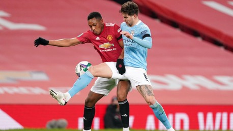 SOLID STONES: John Stones gets the better of Anthony Martial