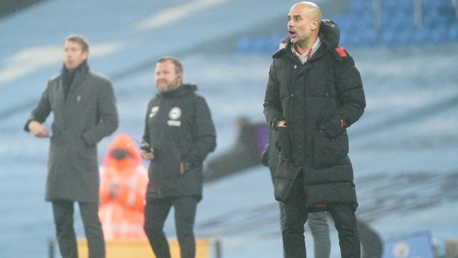 PEP TALK: The boss passes on his instructions from the touchline.