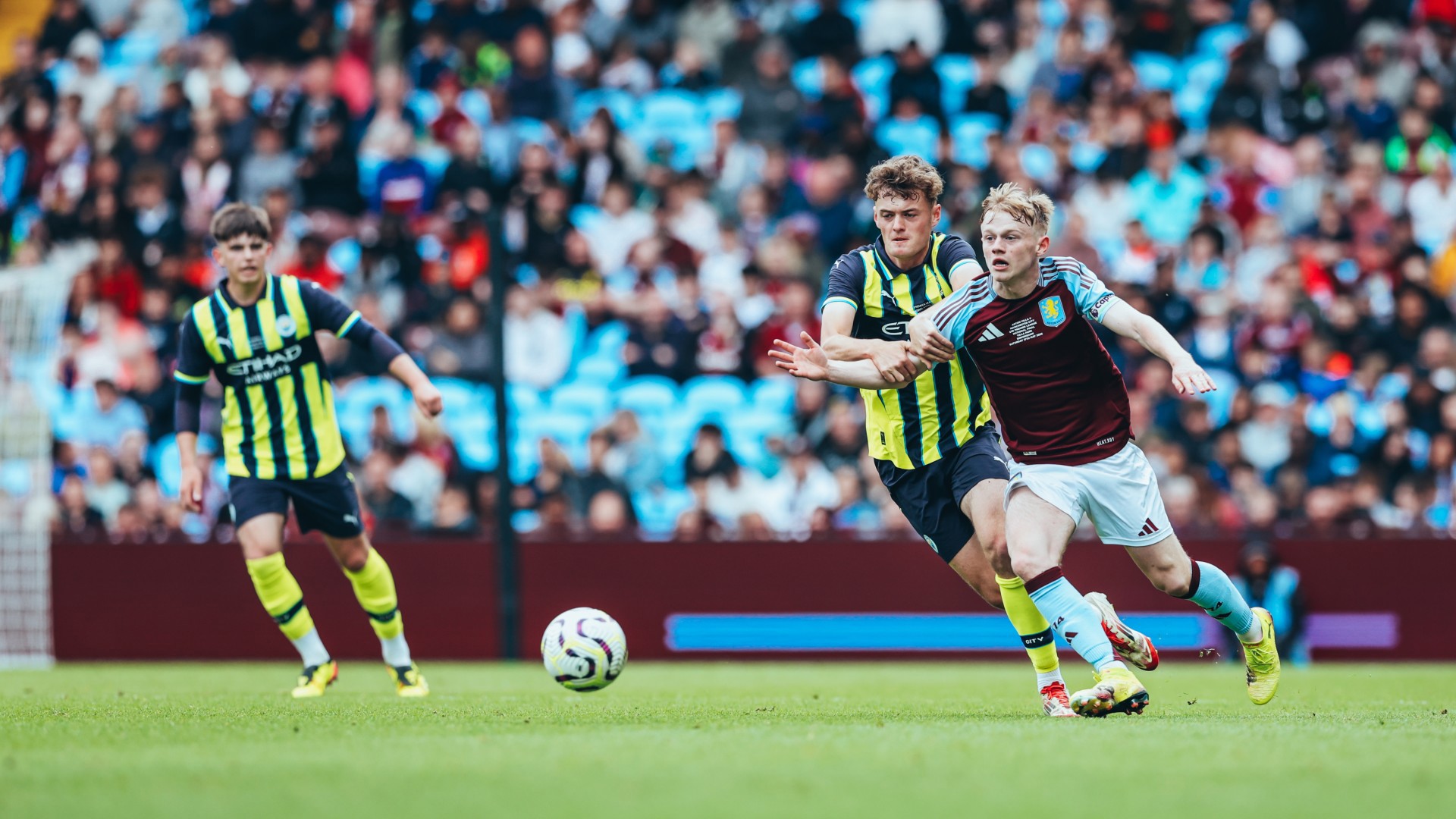 BATTLE : Matty Warhurst puts Villa under pressure.