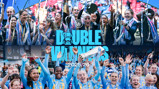 Celebration graphic of Manchester City's double win in the 2025/26 season, featuring players holding trophies and wearing scarves with the club crest.