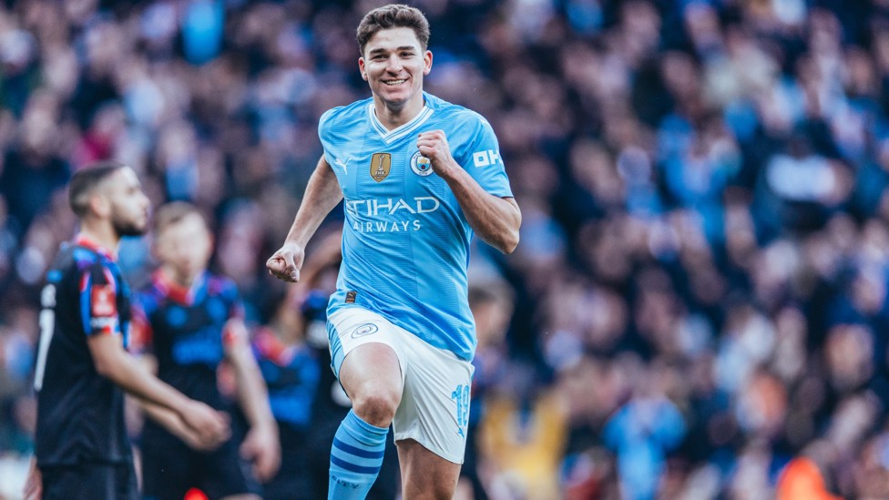 JOLLY JULIAN : Celebrates his goal.