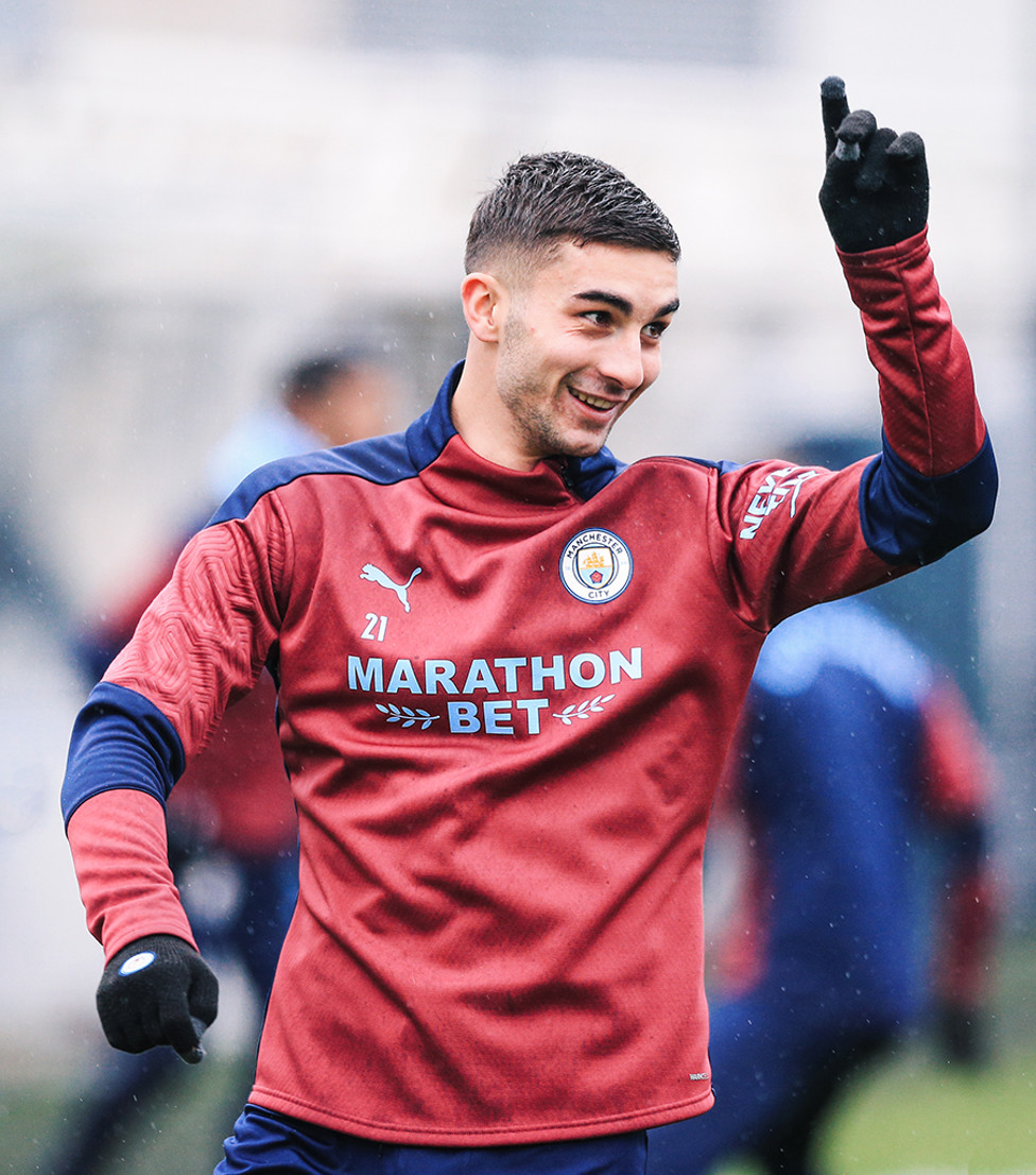 GLOVE STORY: Ferran Torres was kitted out to cope with the December showers