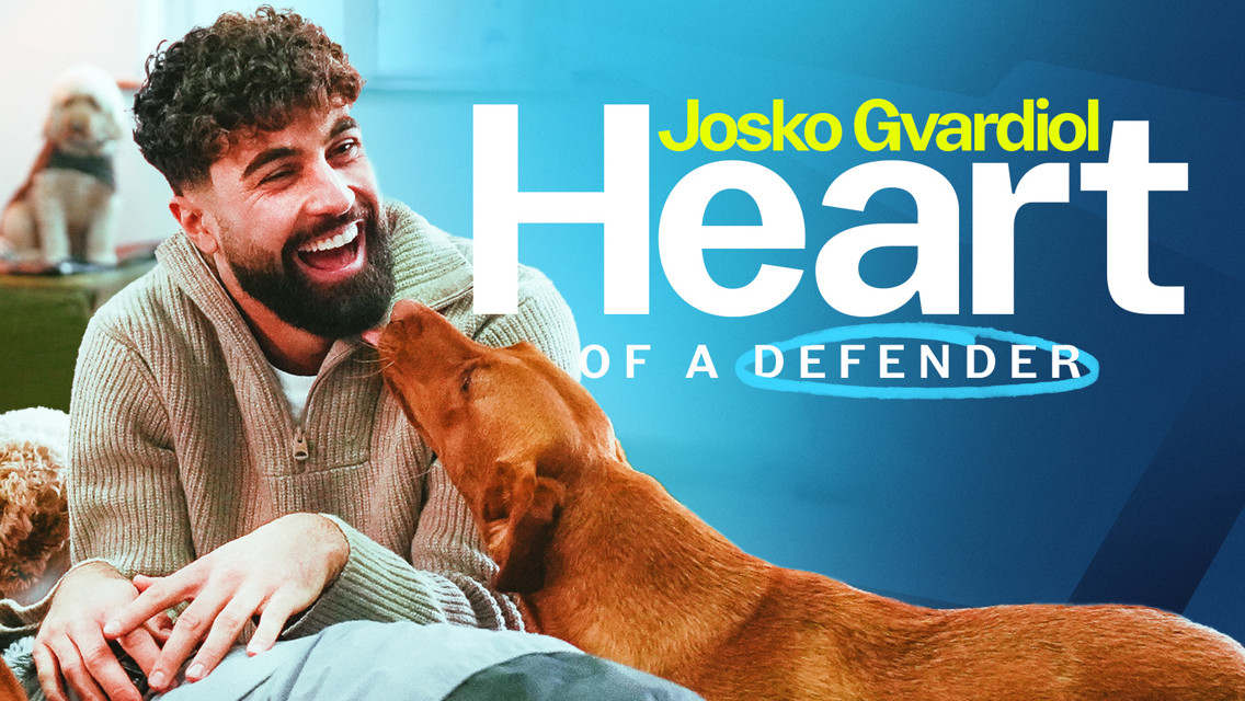Text on a blue background reads 'Josko Gvardiol Heart of a Defender'. A dog is interacting with a person whose face is blurred.