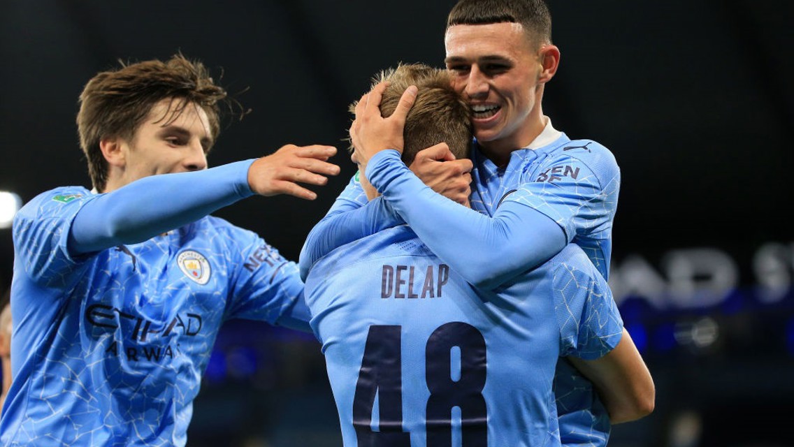 Phil Foden and Adrian Bernabe congratulate Delap