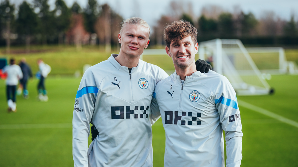FRONT TO BACK : Striker and defender together as Erling Haaland and John Stones pose for the camera