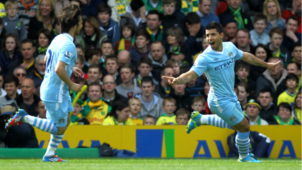 THUNDERBOLT : Sergio celebrates with David Silva after netting what was later voted the goal of the season at Norwich in 2012