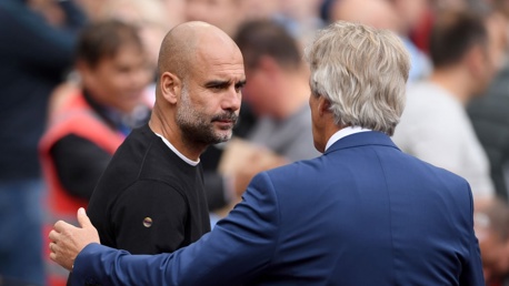 PAST AND PRESENT: Pep Guardiola and Manuel Pellegrini shake hands on the touchline.