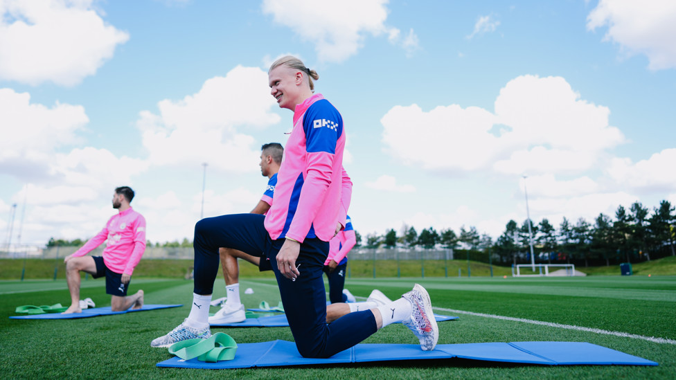UNDERNEATH THE SKY  : Erling Haaland stretches out. 