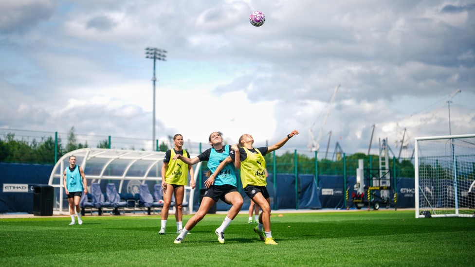 UP IN THE SKY  : Battling for the ball. 