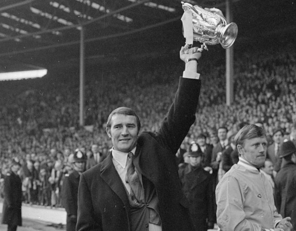 UP FOR THE CUP: Malcolm proudly holds the League Cup aloft after City's win in the 1970 final