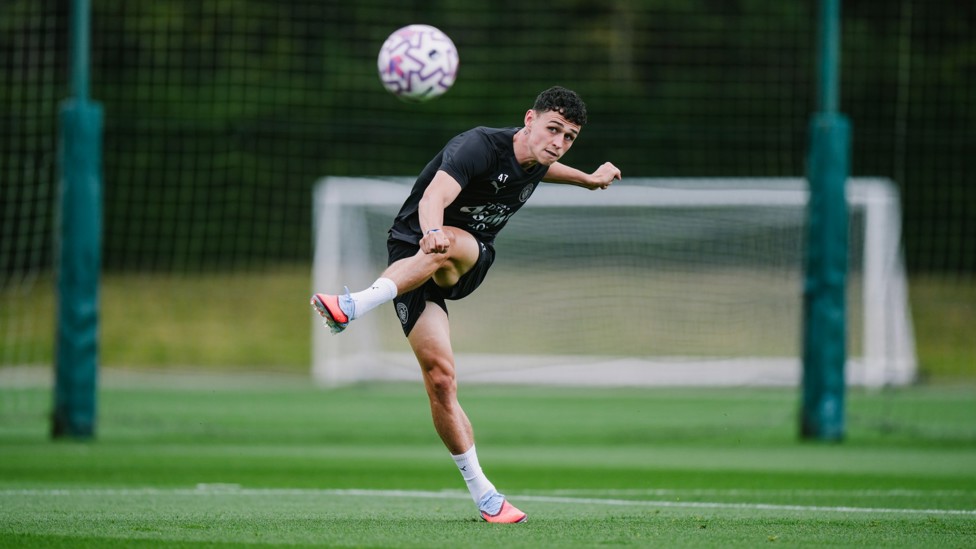 BEND IT LIKE FODEN: Phil Foden curls an effort 