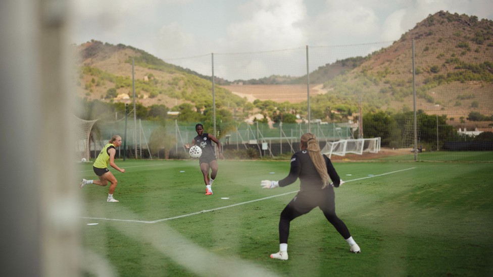 BETWEEN THE POSTS: Bunny Shaw takes a shot against Khiara Keating