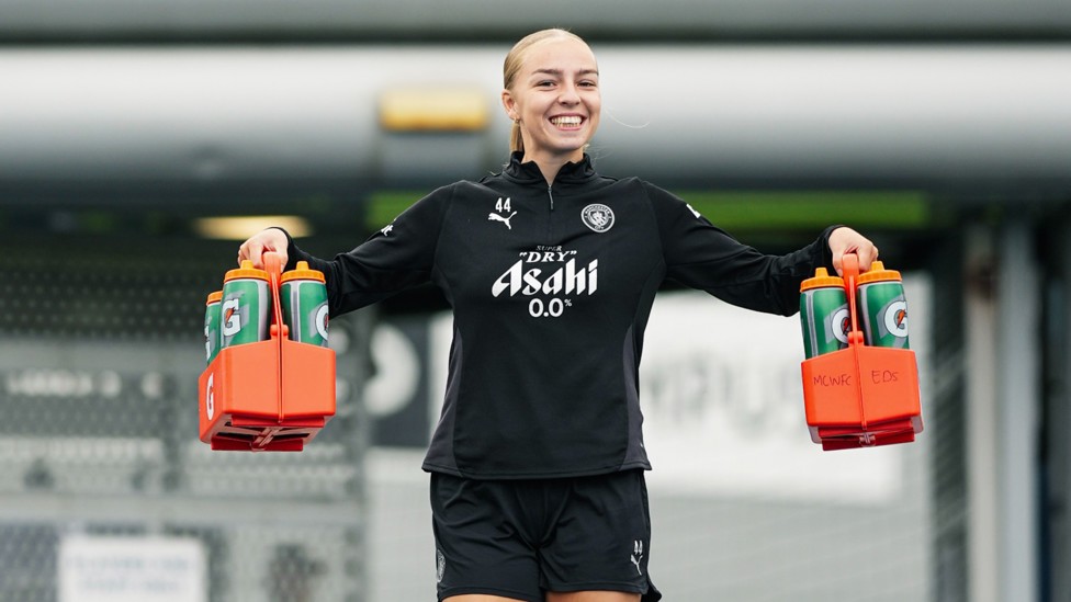 SPECIAL DELIVERY : Codie Thomas on water bottle duty.