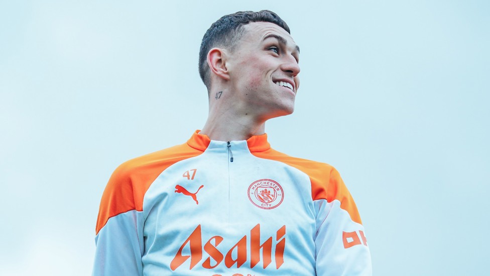 CHEESY GRIN : Phil Foden delights during the session