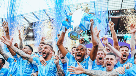 CHAMPIONS: Fernandinho lifts the trophy.