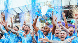 CHAMPIONS: Fernandinho lifts the trophy.