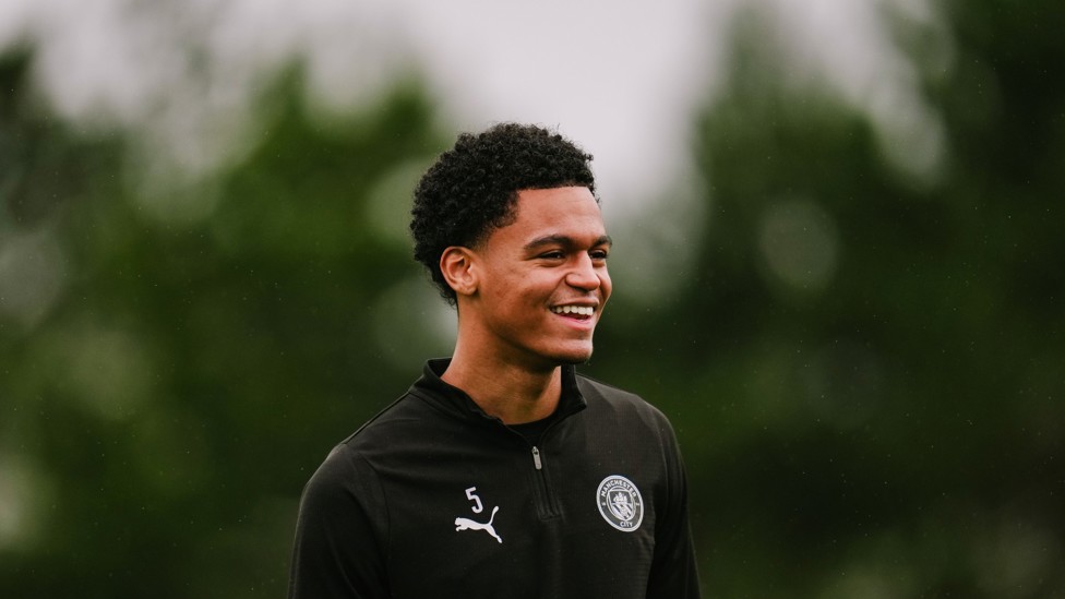 ALL SMILES : Leke Drake makes his way out to training. 