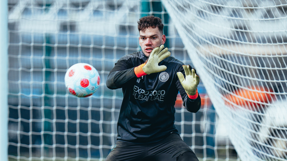 SAFE HANDS : Ederson makes another fine save in training