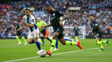 RAZZLE DAZZLE: Raheem Sterling takes on the Brighton defence