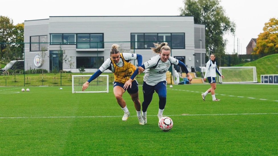 ON YOUR MARKS: Lauren Hemp and Laura Wienroither vie for the ball.