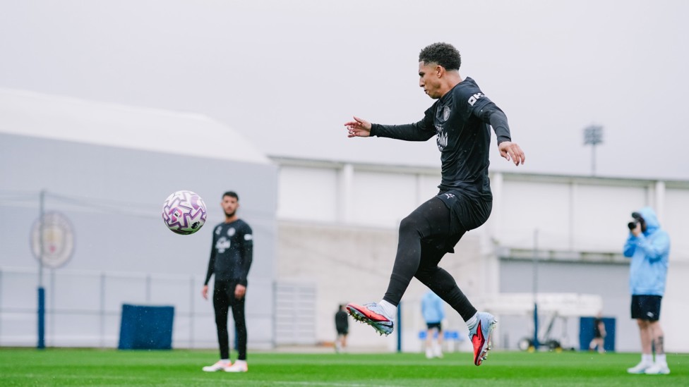 ON THE BALL : Rico Lewis picks up possession