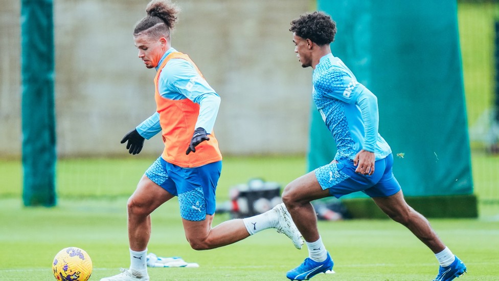 FRIENDLY BATTLE : Oscar Bobb puts Kalvin Phillips under pressure. 