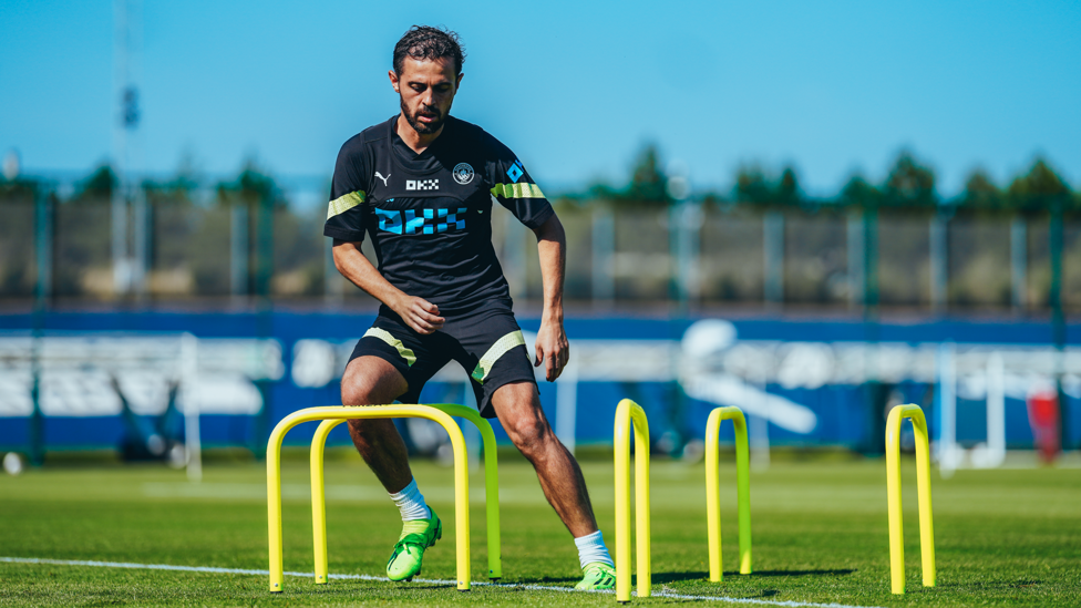 OBSTACLE COURSE : Bernardo Silva weaves his way through a fitness exercise